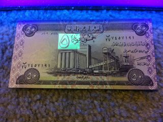 50 Dinars Iraq Iraqi Currency Note Bill Money Uncirculated Banknote Cash photo