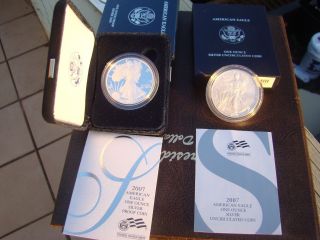 Two 2007 W Proof & State 2007 W Burnished Die Silver Eagles photo