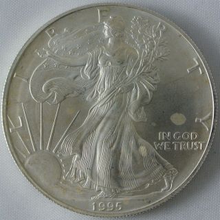 1995 Silver American Eagle S$1 Milky Spots photo