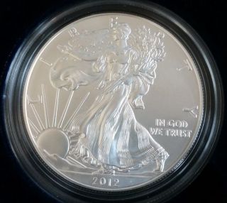 2012 American Eagle One Ounce Silver Uncirculated Coin And photo