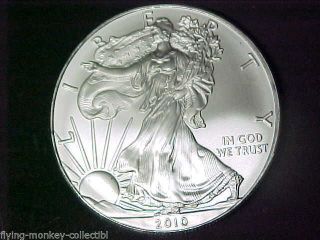 Bu 2010 American Eagle Silver Dollar.  999 Fine Silver 1 Ounce - 12 - 414 photo