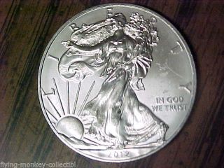 Bu 2012 American Eagle Silver Dollar.  999 Fine Silver 1 Ounce - 81914 photo