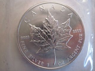 1989 Silver Canadian Maple Leaf,  One Oz Uncirculated,  Rcm Package photo