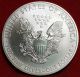 Uncirculated 2012 American Eagle Dollar Silver photo 1