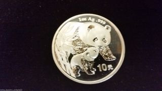 2004 1 Oz Silver Panda.  999 Fine Silver Coin photo