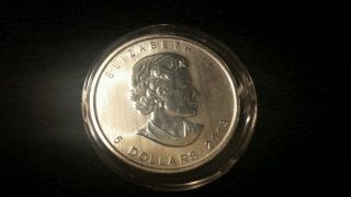 2013 Silver Canadian Maple Leaf In Air - Tite - 1 Troy Ounce - (3) photo