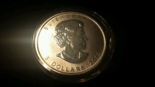 2013 Silver Canadian Maple Leaf In Air - Tite - 1 Troy Ounce - (2) photo
