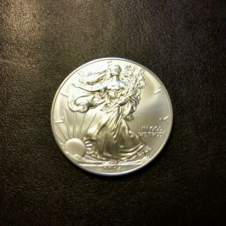 2014 1 Oz Silver American Eagle - Brilliant Uncirculated,  Silver Dollar photo