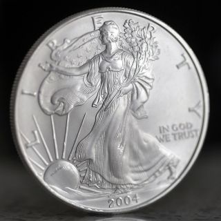Walking Liberty One Dollar.  999 Fine Silver Uncirculated Coin 2004 photo