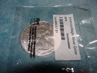 2010 $1 Silver Unc American Eagle Dollar In Littleton Pack / 1 Oz.  999 - Toned photo