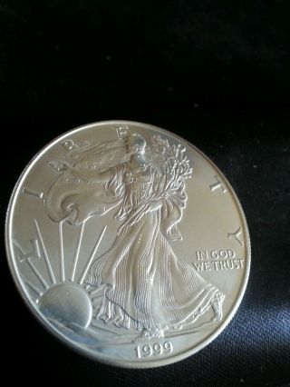 1999 1 Oz Silver American Eagle,  Bu.  Brilliant Uncir.  Bonus Protective Sleeve photo