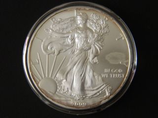 2009 American Silver Eagle,  Bu (toning/spots) photo