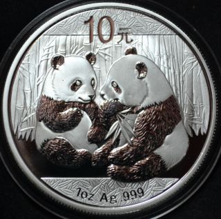 3464 - 2009 - Chinese Panda - 1 Troy Ounce 999 Fine Silver - 10 Yuan Coin photo