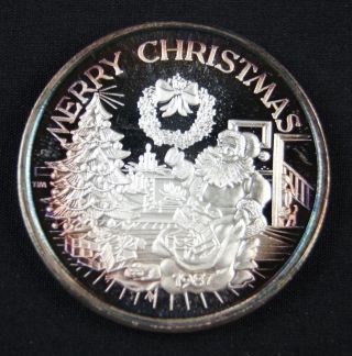 1987 Merry Christmas 1 Oz.  999 Fine Silver Coin 