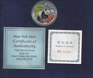 1997 Chinese Panda.  Colorized.  10 Yuan.  1 Oz.  0.  999 Fine Silver. photo