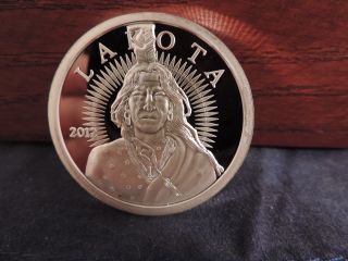 Lakota 1 Oz.  999 Silver Uncircluated Proof Round 2012 Encapsulated photo