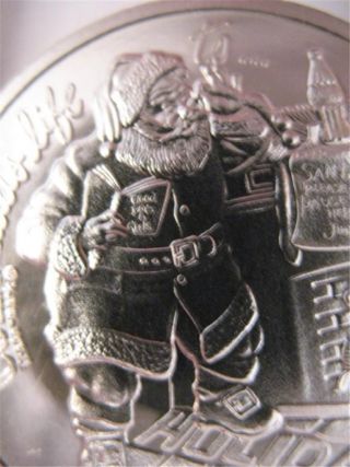 1977 Rare Christmas Santa Coke Adds Life Coin Holiday Fun Pure Silver.  999,  Gold photo