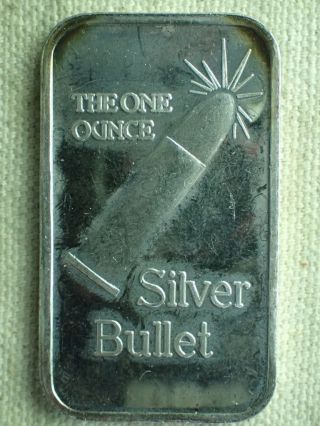 1 Ozt.  999 Silver Bullet Bar.  Cool photo