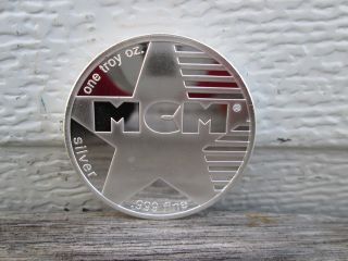 1 Troy Ounce.  999 Pure Silver Modern Coin Mart Round photo
