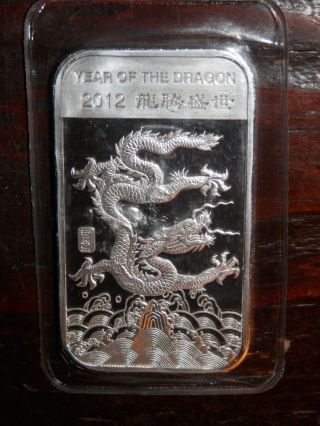 1 Troy Ounce Of.  999 Silver Bar - Year Of The Dragon 2012 - Graphics photo