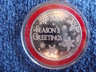 2006 Seasons Greetings,  1 Oz.  999 Silver Happy Holidays Silver Round photo