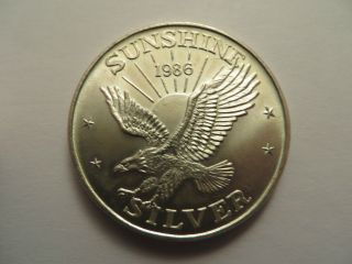 1 Oz Silver Round, .  999 Fine,  Sunshine Eagle,  Dated 1986 photo