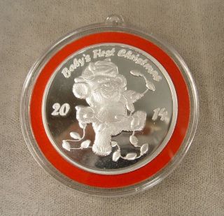 1oz.  999 Fine Silver Round / 2014 Baby ' S First Christmas Red - Engraving photo
