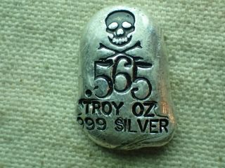 . 565 Ozt.  999 Silver Skull & Crossbones Bar.  Hand Poured.  Cool photo