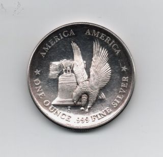 1 Ounce.  999 Silver Flying Eagle Liberty Bell International Trade Unit Round photo