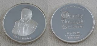 Milton S.  Hershey Chocolate.  999 Silver Round Employee Commemorative Coin photo