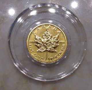 2014 Canada 1/10 Troy Oz.  9999 Gold Maple Leaf $5 Coin - - L164a photo