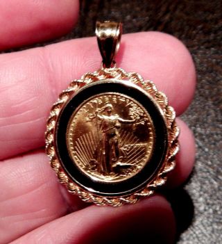 1989 Dated 1/10 American Gold Eagle In A 14k Gold And Onyx Bezel Pendant photo