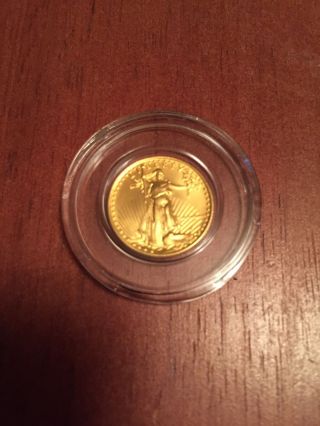 1986 1/10 Oz.  Troy American Eagle Gold Roman Numerals,  Mcmlxxxvi photo