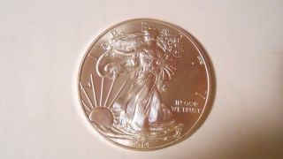 1 Oz.  99.  9 Pure Silver American Eagle 2014 Newly Minted U.  S.  Coin photo