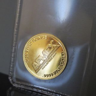 1/10 Oz Apmex.  9999 Pure Gold Round In Package photo