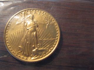 1986 Fine Gold United States $10 American Eagle 1/4 Ounce Coin Uncirculated photo