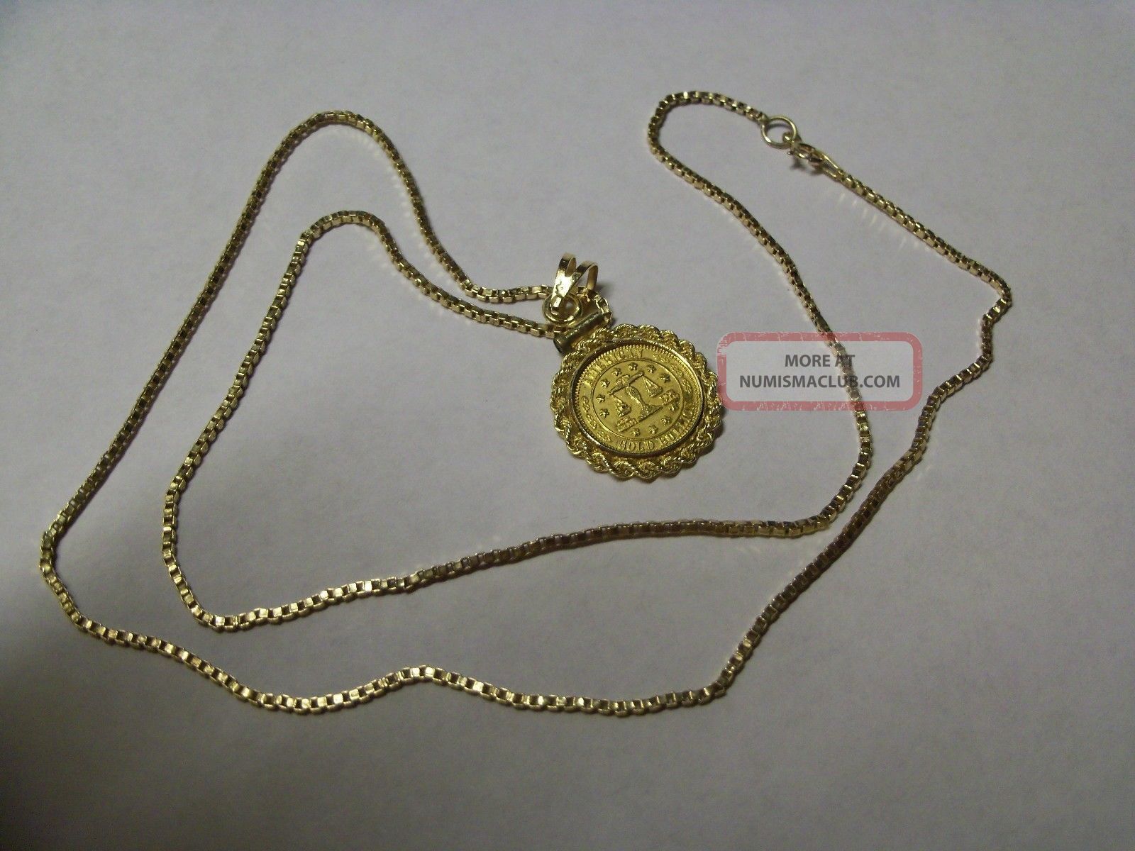 1-gram-pure-24k-gold-coin-with-bezel