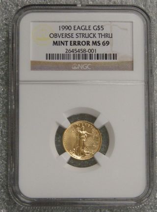 1990 - 1/10 Oz.  Gold American Eagle $5 - Obverse Struck Thru Error - Ngc Ms 69 photo