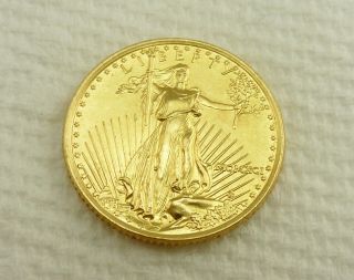 1/10 Ounce Gold Eagle Coin,  U.  S.  A.  Uncirculated,  Over All Coin photo