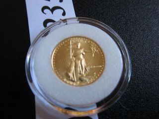 1986 American Gold Eagle 1/10 Oz $5 Coin In Plastic Capsule photo
