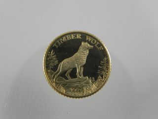 1992 U.  S.  National Forests Service Gold Coin - 100 Years - Wolf 1/10 Ounce.  1 Oz photo