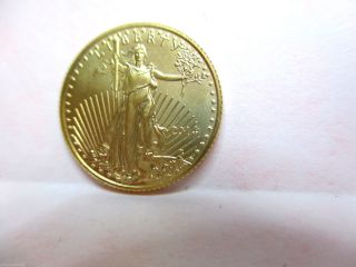 1 - 2014 - $5 Gold American Eagle 1/10th.  Fine photo