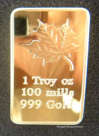 Gold Bar 1 Oz Maple Leaf 100 Mills.  999 24k 1 Ounce Fine Bullion Ingot photo