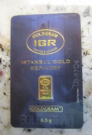 1/2 Gram 999.  9 24k Gold Bullion Bar Includes Certificate On Back Of Card photo