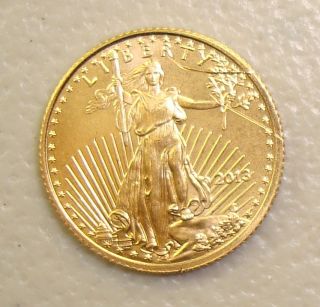 2013 1/10 Oz $5 American Gold Eagle Bullion Coin,  Uncirculated Scratched photo
