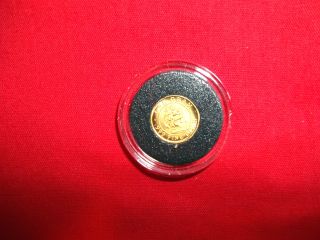 1 Gram.  999 Fine Gold Coin,  Monarch Precious Metals Uncirculated. photo