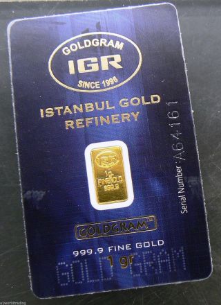 1 Gram Gold Igr Goldgram.  9999 Pure Bar Ingot With Serial On Card photo