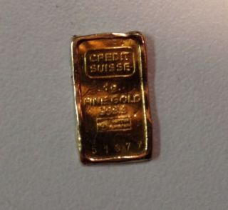 1 Gram 999.  9 Fine Gold Credit Suisse Gold Bar photo