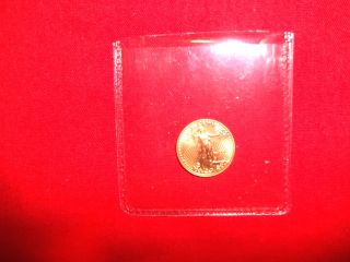 2014 1/10th Oz.  Gold American Eagle $5.  00 Coin.  Uncirculated. photo