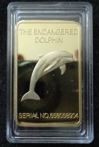 1 Australia,  The Endangered Dolphin One Troy Ounce.  999 Fine Gold Clad photo